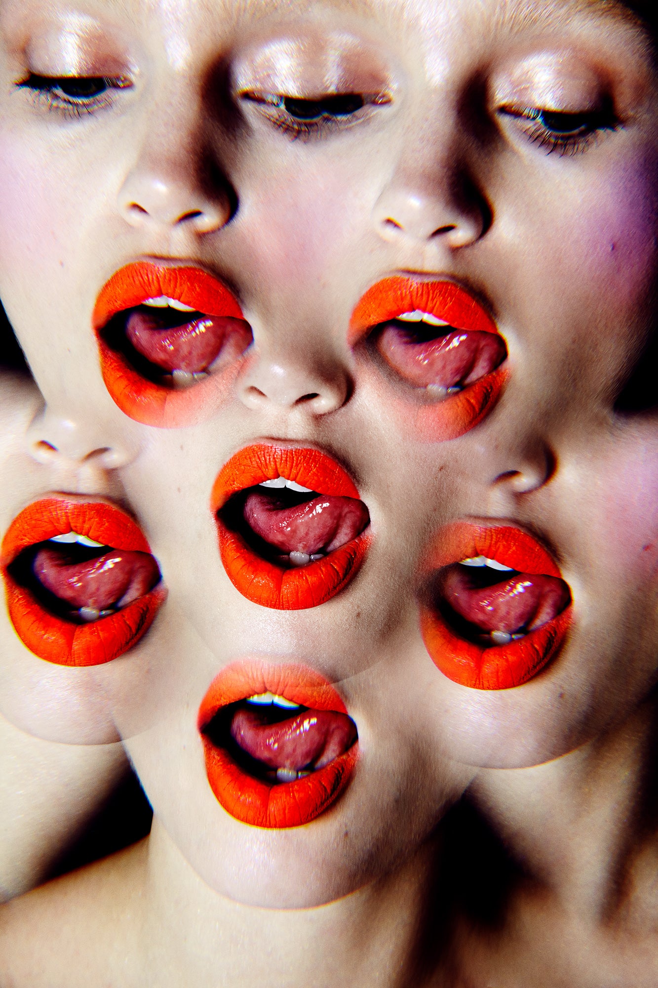Woman with tongue out wearing orange lipstick. Multiple mouths and tongues are shown due to Prismatic kaleidoscope photography effect