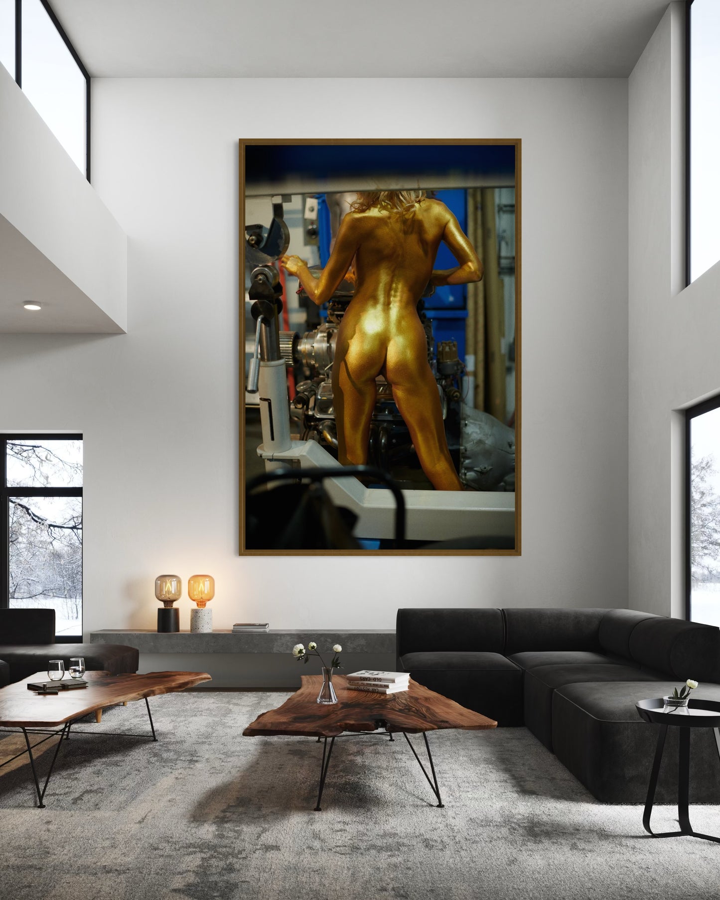 Modern living room with a large framed artwork of a gold nude muscular woman working in a factory.