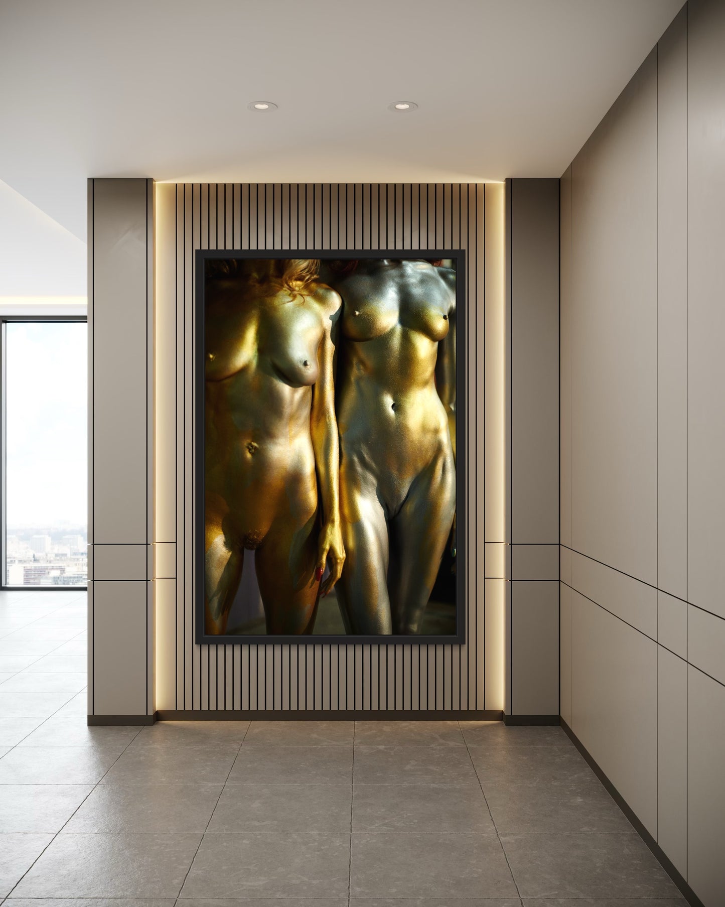 Modern art gallery with a large framed artwork of two nude figures on a wall by female fine art photographer Jamie Nelson.