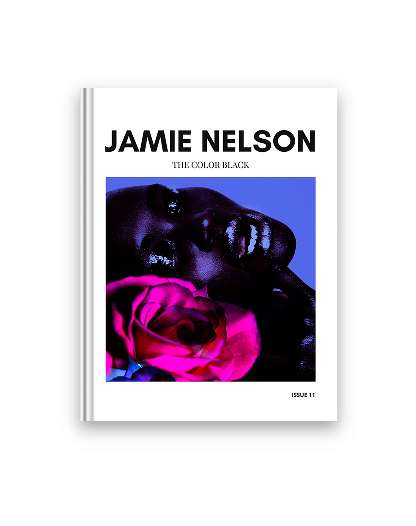 Book cover with 'Jamie Nelson' and 'The Color Black' on a white background. On the white background is a square image of a black woman with a pink vibrant rose near her face.