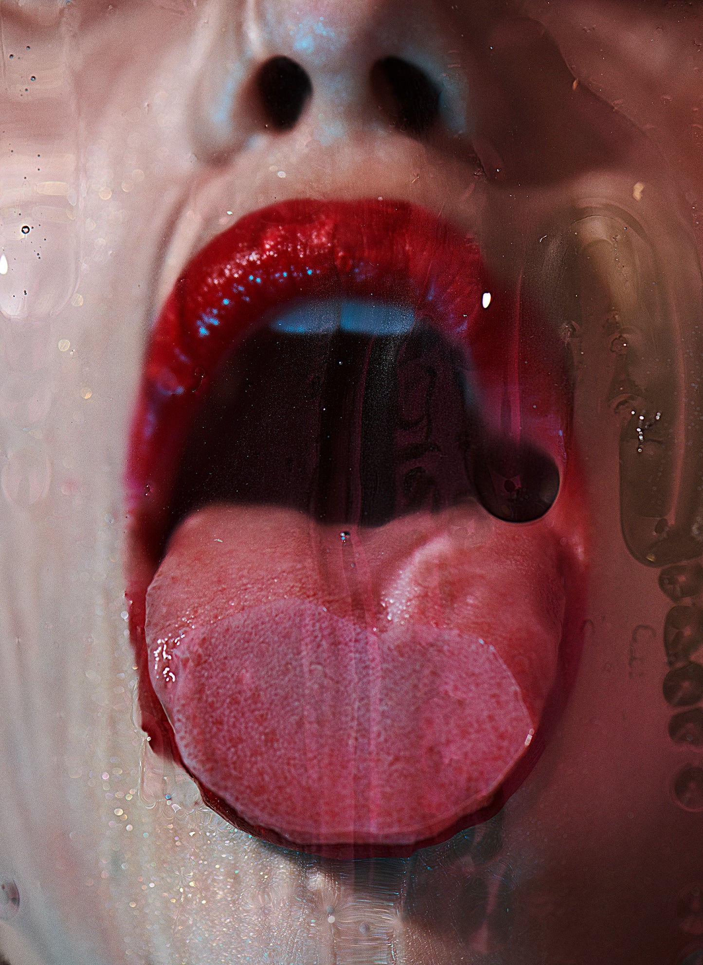 Woman licking dirty slimey glass with red lipstick and tongue out