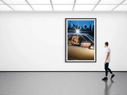 Fine-art-print-of-amy-taylor-mooning-camera-out-of-a-gold-vintage-car-with-the-words-sniffers-written-on-her-custom-zana-bayne-belt