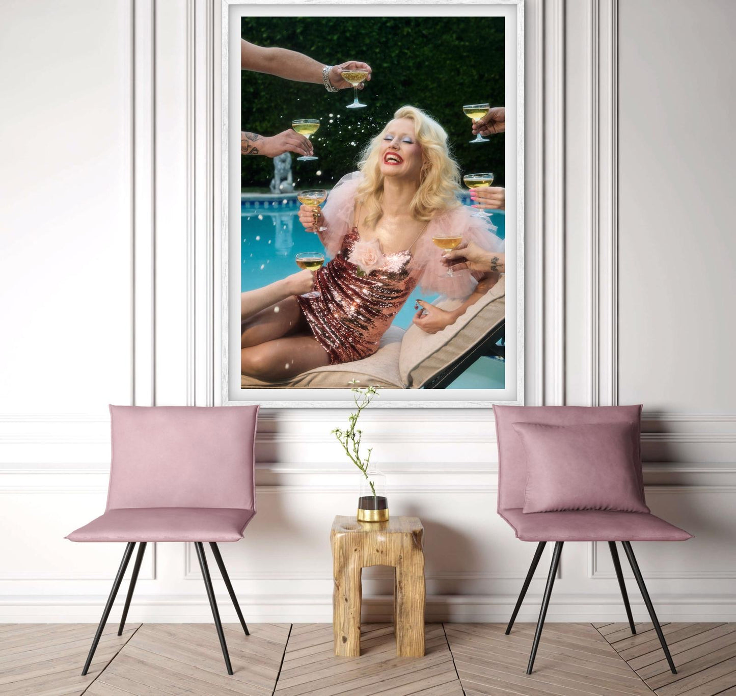 Framed artwork of punk singer Amy Taylor of Amyl and the Sniffers, by a pool wearing a glamorous sequined dress as she's being served six glasses of champagne by multiple arms coming into the frame.
