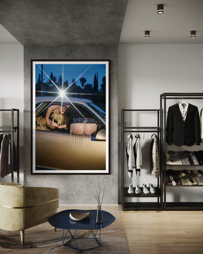 Large fine art print of Amy Taylor of Amyl and the Sniffers as she defiantly moons the camera and flips the bird out of a gold car.