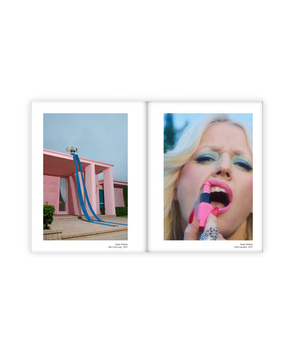 An open book featuring images of a girl on top of a pink house wearing 20 foot long jeans. Next to that image is a retro styled blonde girl wearing blue eyeliner applying phallic shaped pink lipstick.