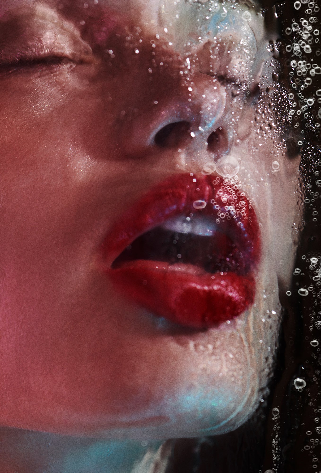 Woman with big red lips breathing onto shower glass fogging up window air bubbles suffocating drowning