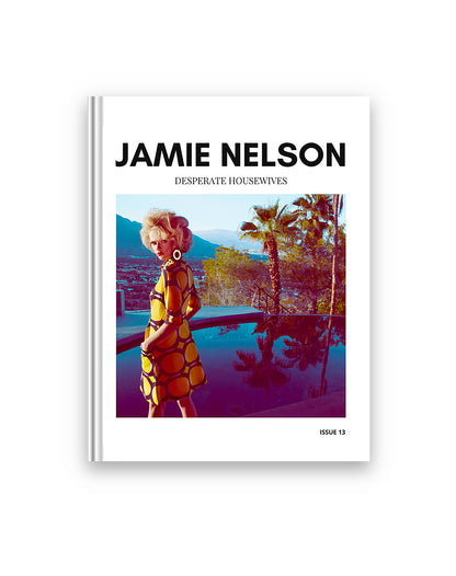Book cover of 'Desperate Housewives' by Jamie Nelson with a woman in a yellow dress standing by a pool.