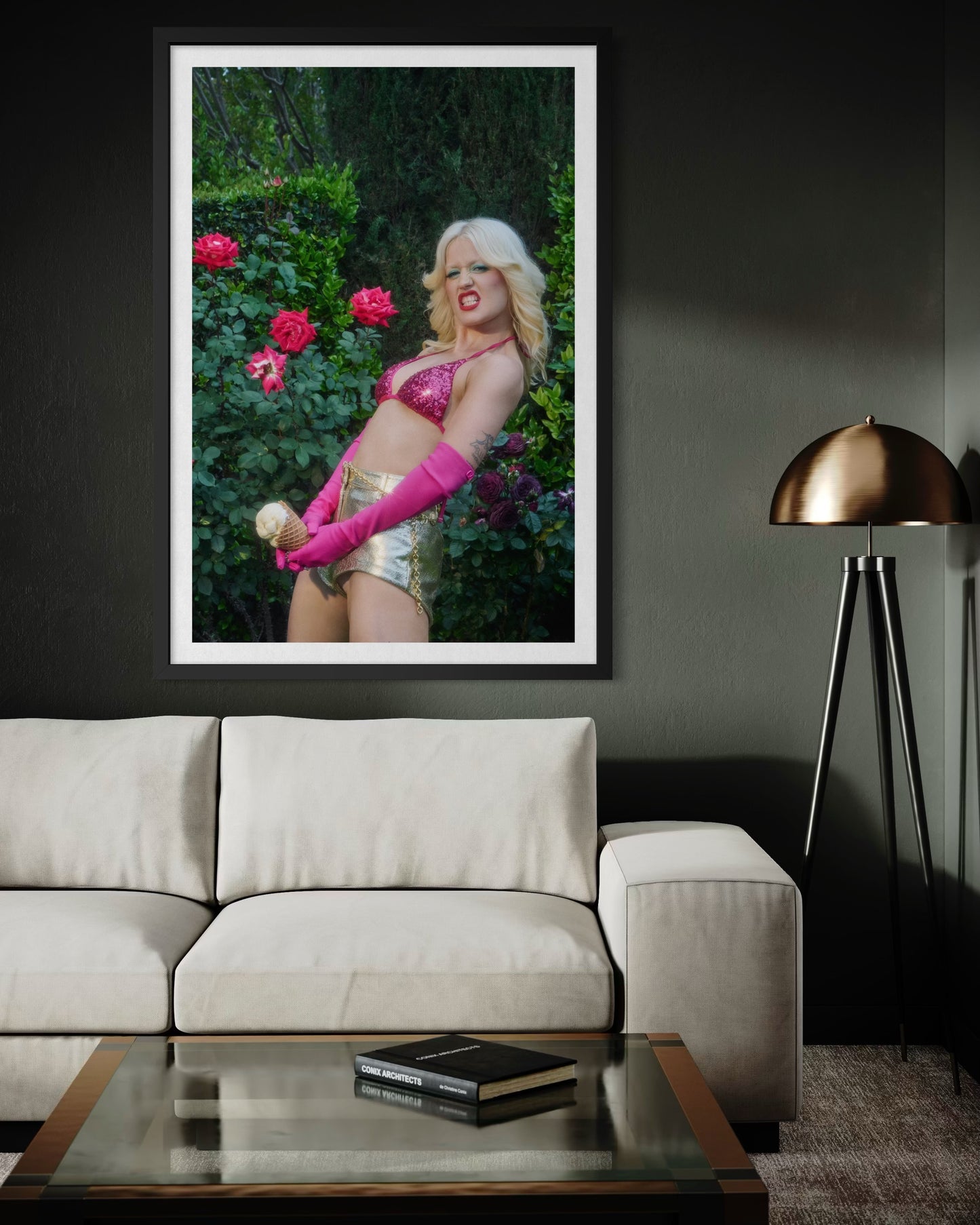 Fine art print of a 70's style glam rock woman dressed in a sequin pink bikini with a flipped-out hair style and gold disco shorts. She is in a rose garden holding an ice cream cone near her crotch, displaying her "big dick energy".