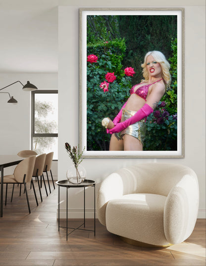A framed artwork of Amy Taylor, singer of Amyl and the Sniffers, raucously displaying "big dick energy" as she holds an ice cream cone near her crotch while she grits her teeth.