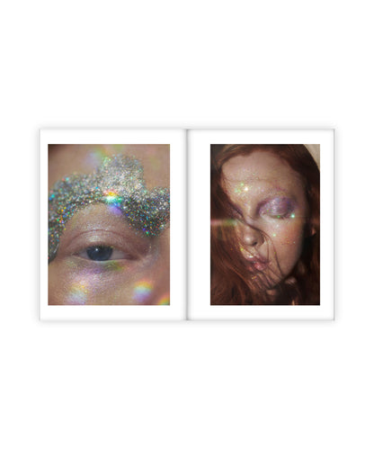 Two framed artworks of a woman's face with glittery makeup on a white background