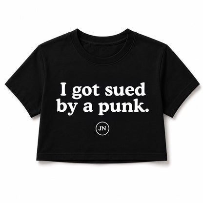Back 80s style crop top "I got sued by a punk." Punk and lawsuit themed apparel.
