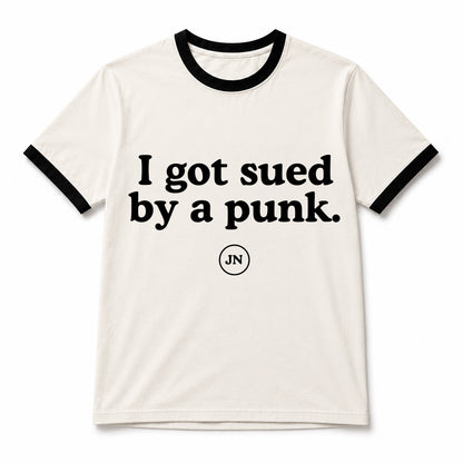 I got sued by a punk T-shirt. This shirt supports Jamie Nelson in her federal copyright lawsuit against a punk singer.