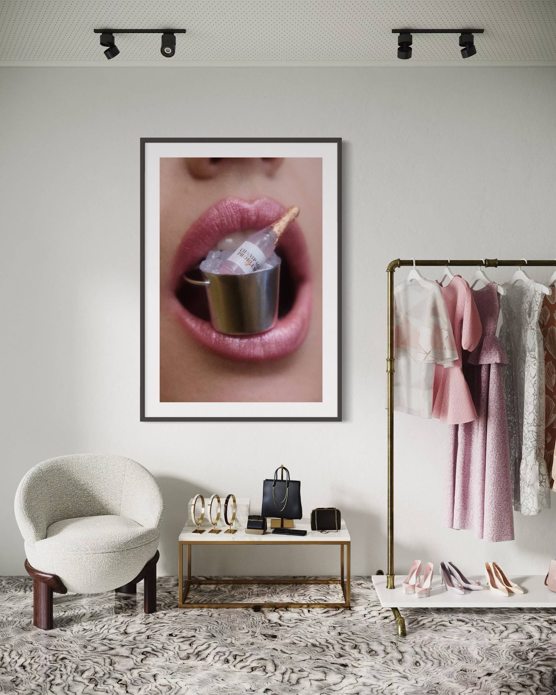 Framed artwork of a Amy Taylor's mouth with miniature bucket of ice and champagne bottle held between her lips.