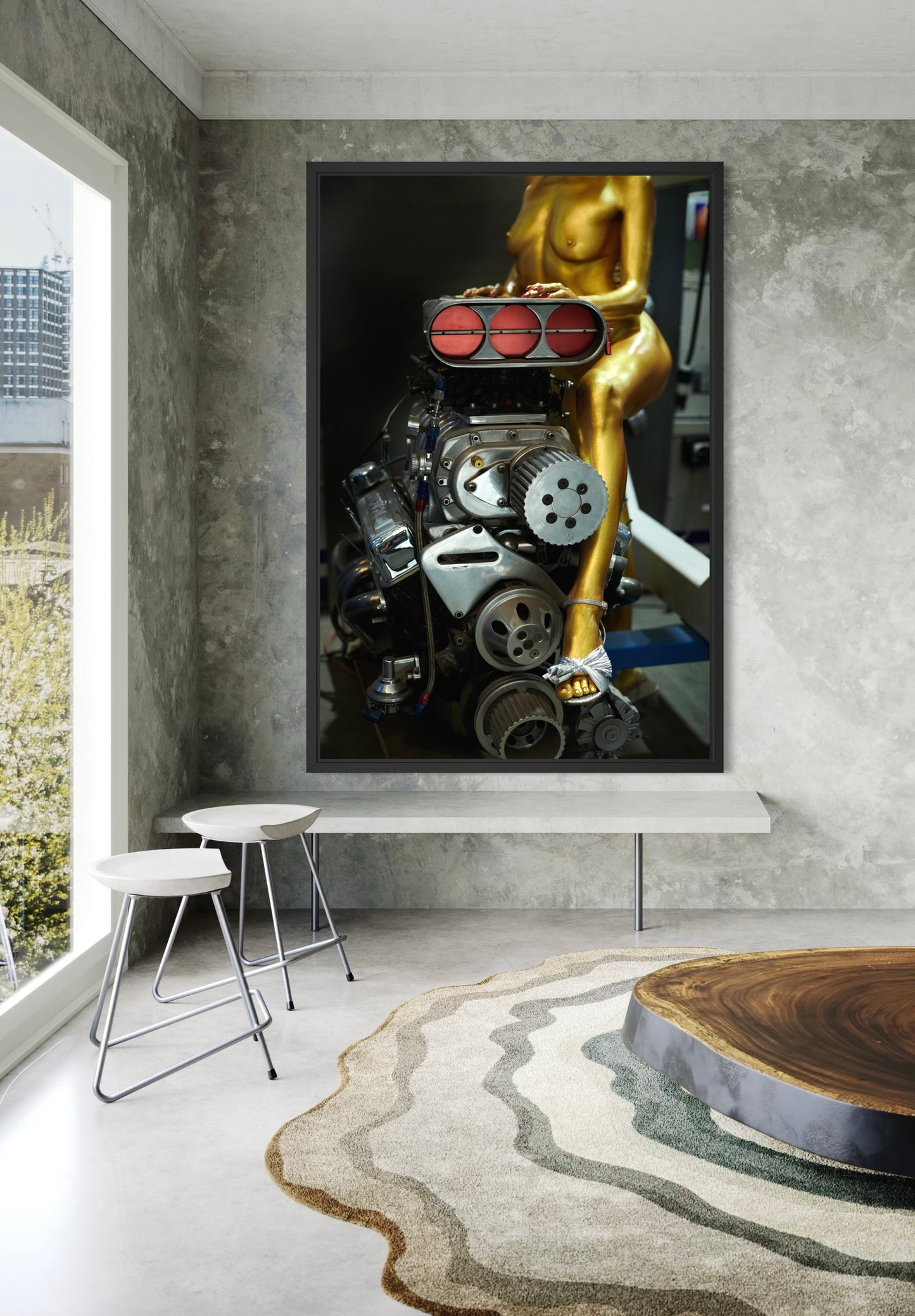 Framed artwork of a mechanical 6-71 blower engine  with a golden nude figure on a wall in a modern masculine room.