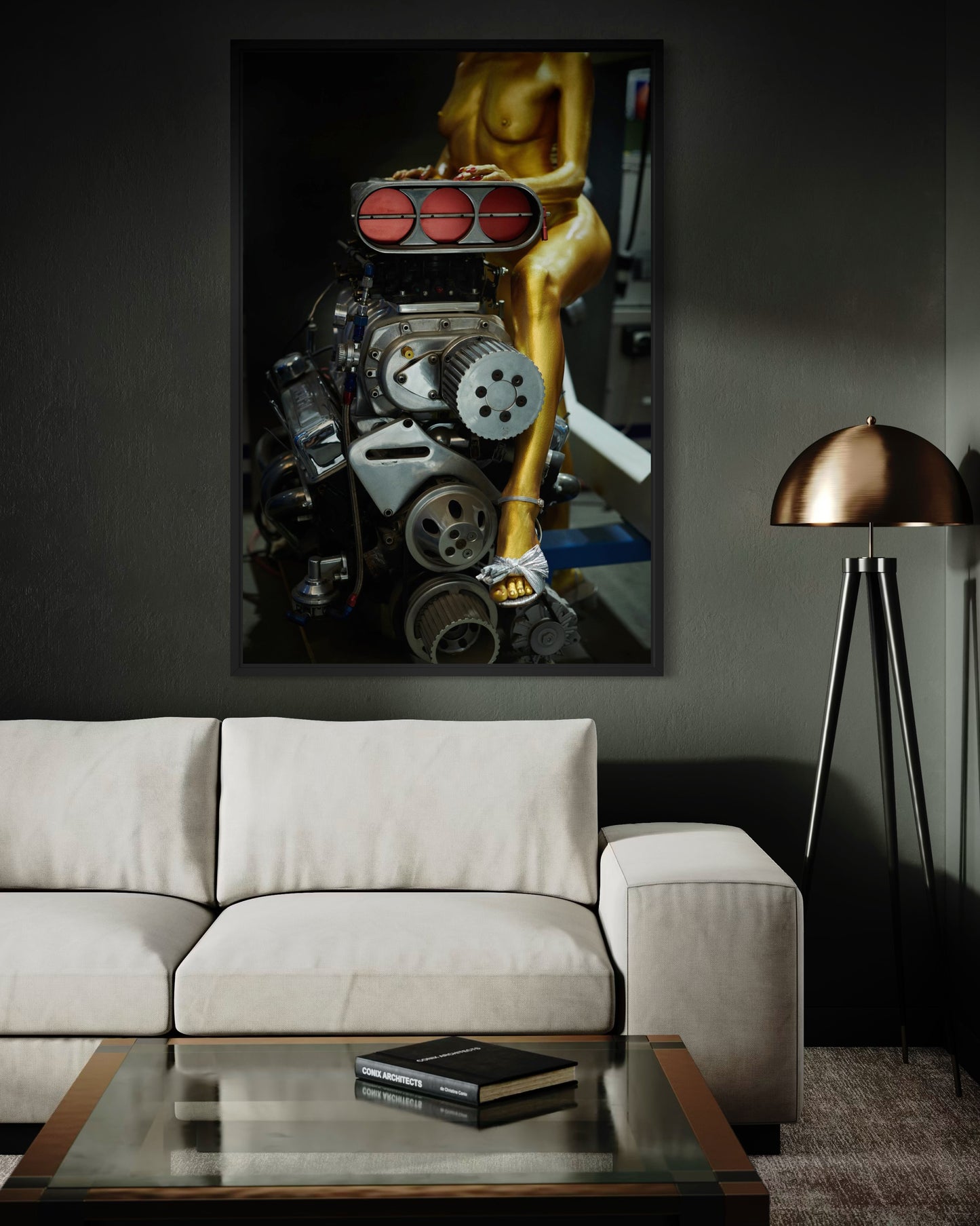 Framed artwork of a mechanical  6-71 blower engine and a golden figure on a wall above a beige sofa in a modern living room.