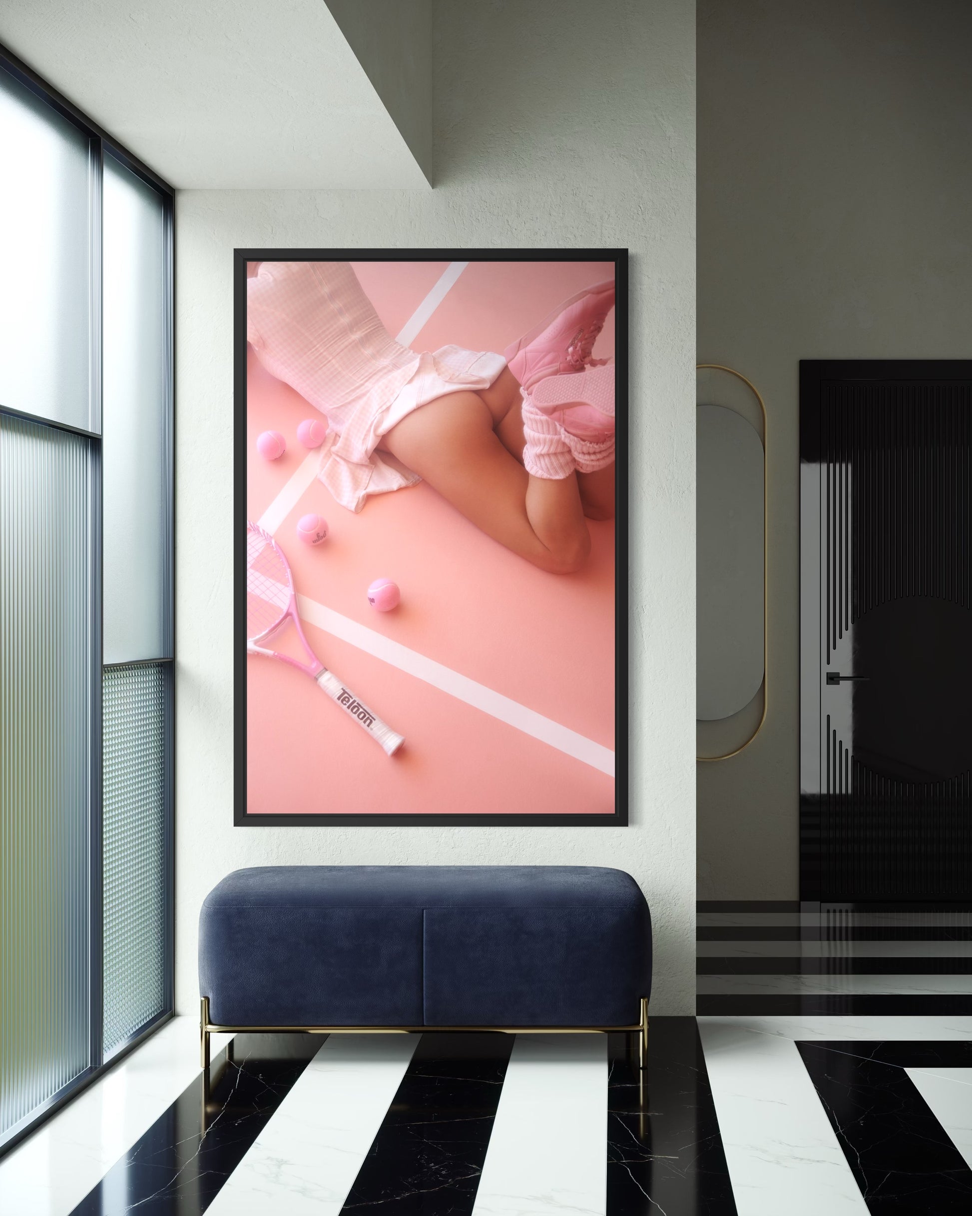 A modern interior with striped floors and a large framed artwork of a woman wearing pink 80s shoes and leg warmers on a pink tennis court with her butt hanging out of her short dress.