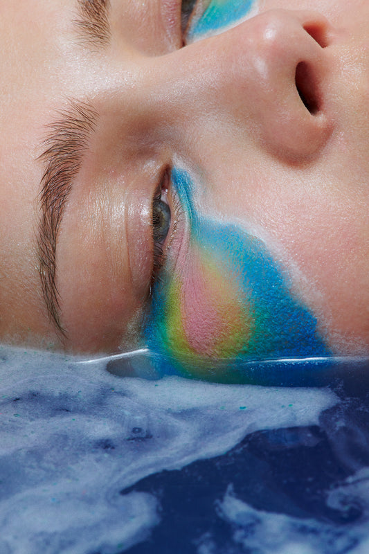 woman female model crying makeup running wearing colorful artistic makeup laying her face in water trippy psychedelic beauty editorial 