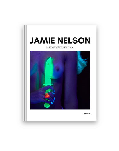 Book cover of 'The Seven Deadly Sins' by Jamie Nelson with a glowing green object on a white background